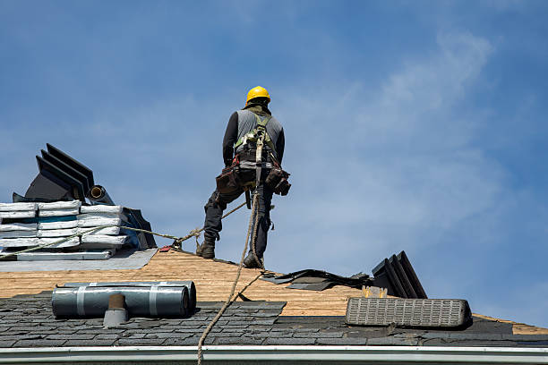 Professional Emergency Roof Repair technician working in Marshall, MO